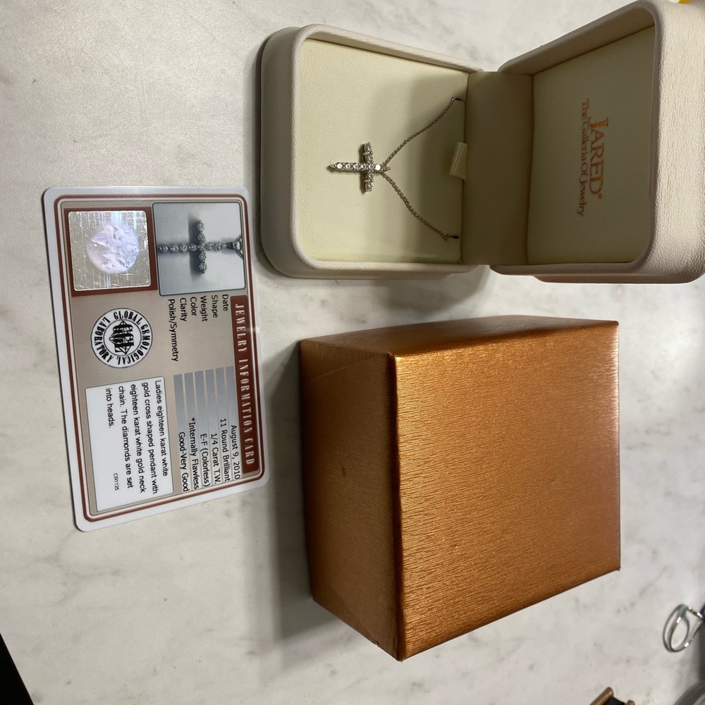 Jared’s cross necklace